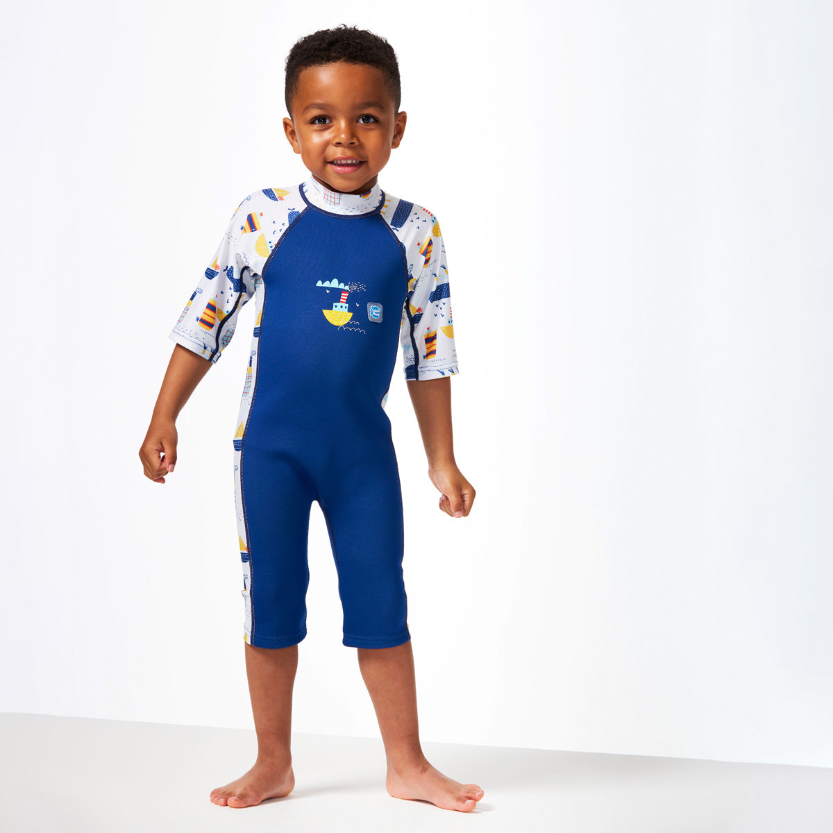 Rash Vest or UV Suit for Kids? What to Choose and When